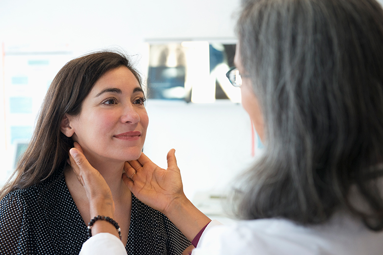 Woman being seen by a doctor